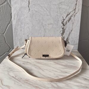 Cream Skull Embossed Crossbody Bag Adjustable Strap Edgy Chic